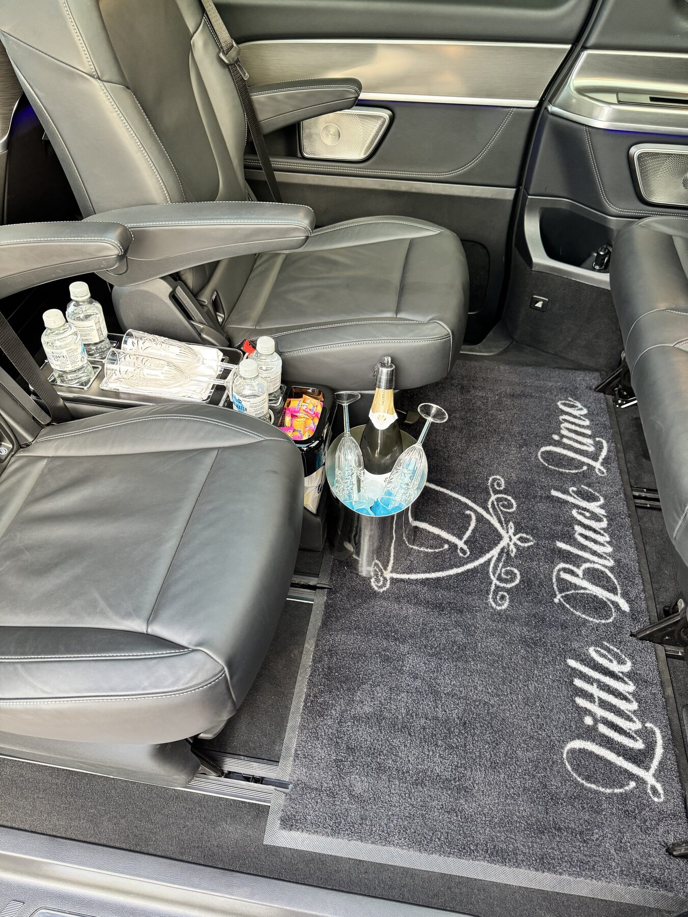 Interior amenities including water and glassware