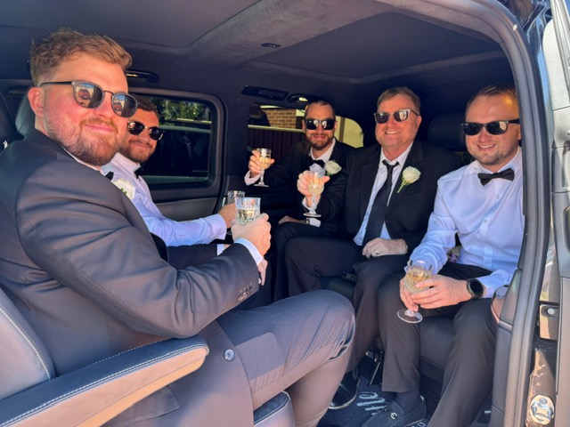 Group celebration in the limo