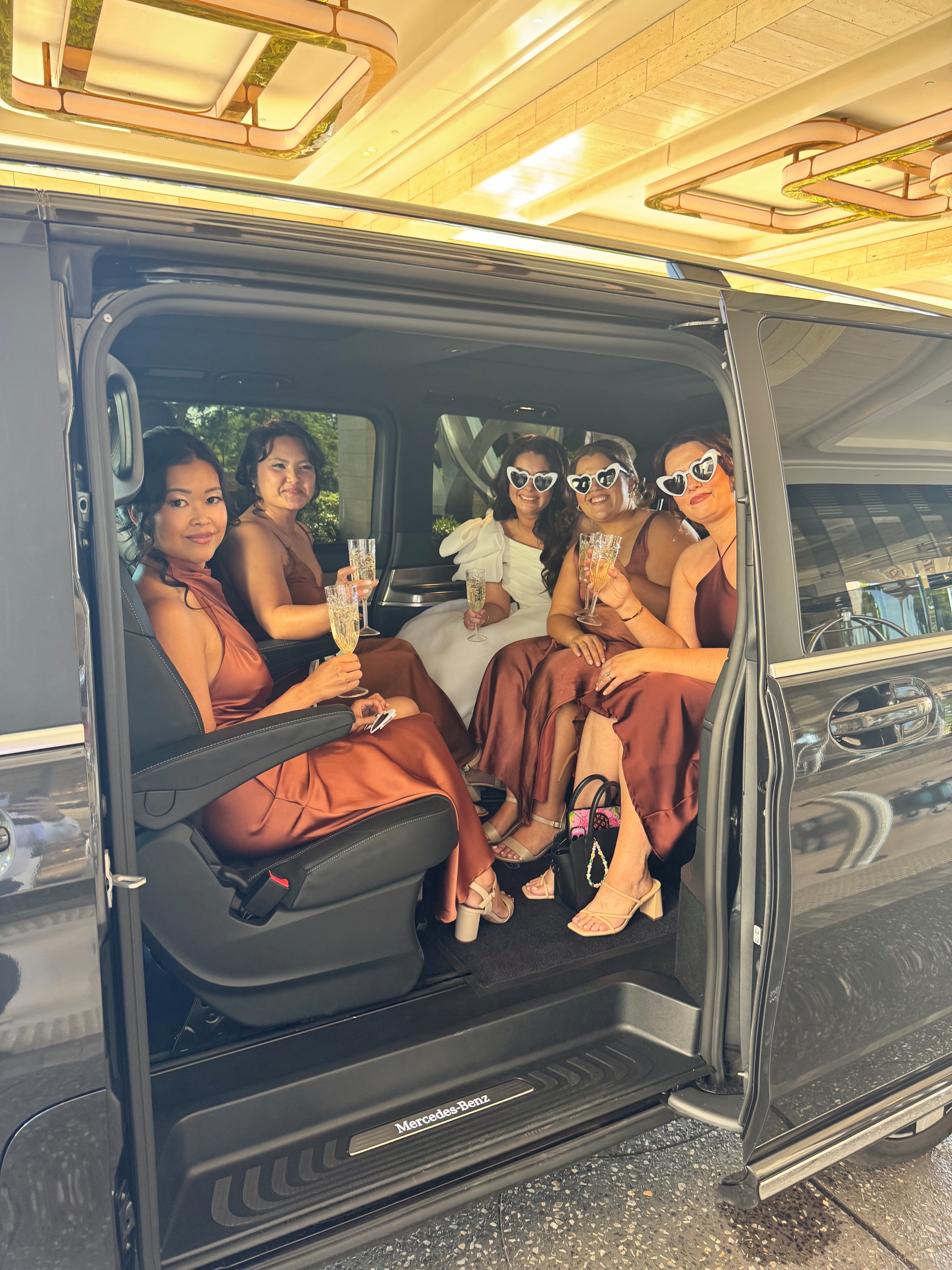 Champagne toast inside the limo